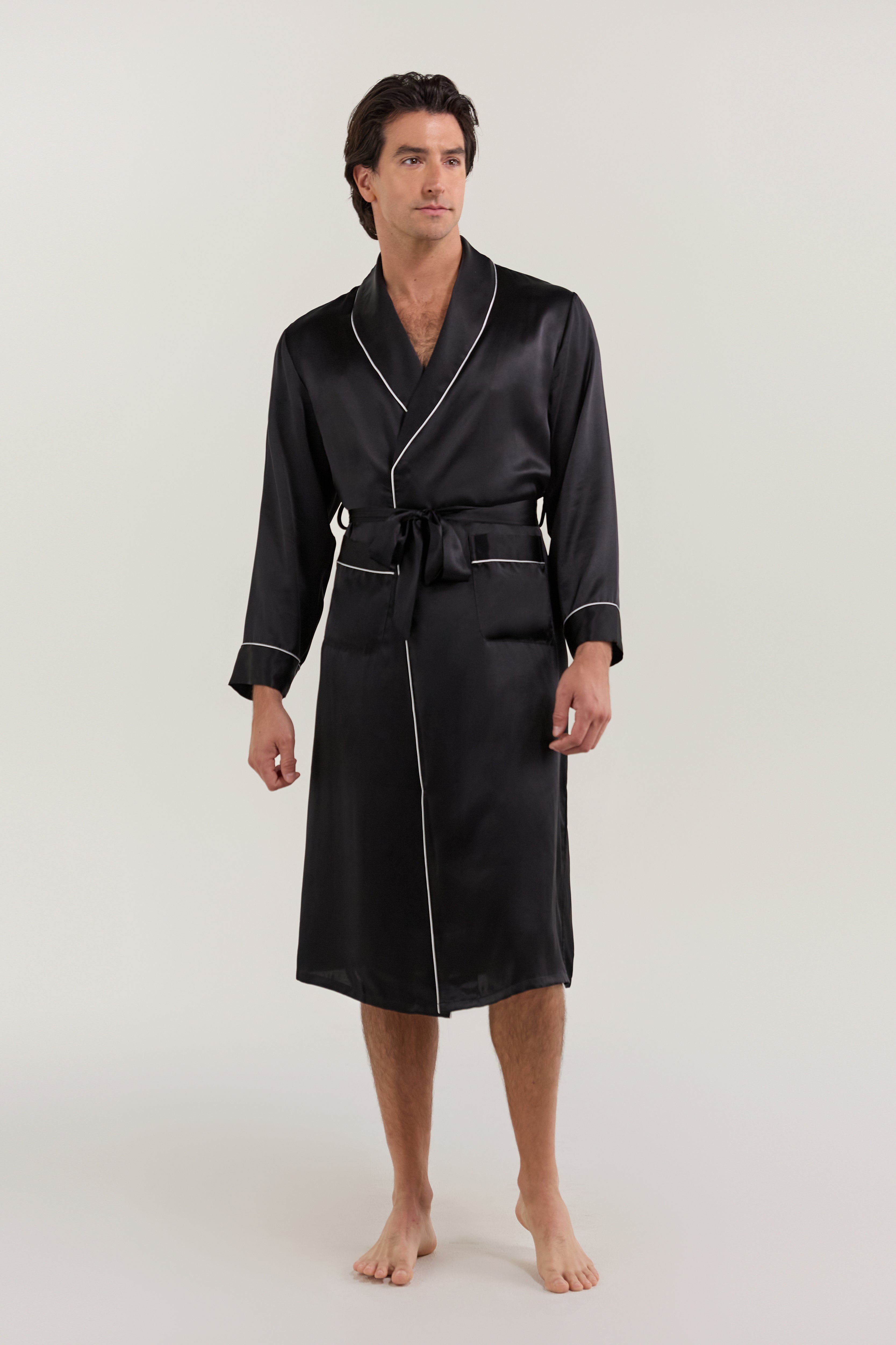 Man wearing Jasmisilk men's black pure silk robe