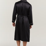 Back view of man wearing Jasmisilk men's black pure silk robe