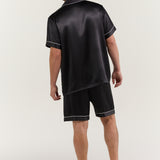 Back view of man wearing Jasmisilk men's classic black short sleeve silk pajama set