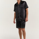 Man wearing Jasmisilk men's classic short sleeve black silk pajama set