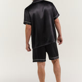 Back view of man wearing Jasmisilk men's classic black short sleeve silk pajama set